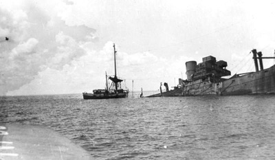 1943 Torpedoed British Ship in the ocean. black and white